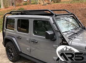 A Grey JL Wrangler 4xE With Rack System Mounted on the Jeep