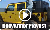 Body Armor Playlist with a man standing on black MetalCloak fenders on yellow and black jeep